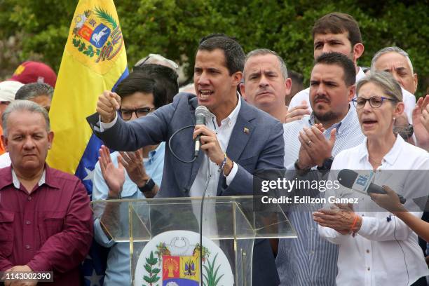 Opposition leader Juan Guaido, recognized by many members of the international community as the country's rightful interim ruler, speaks to...