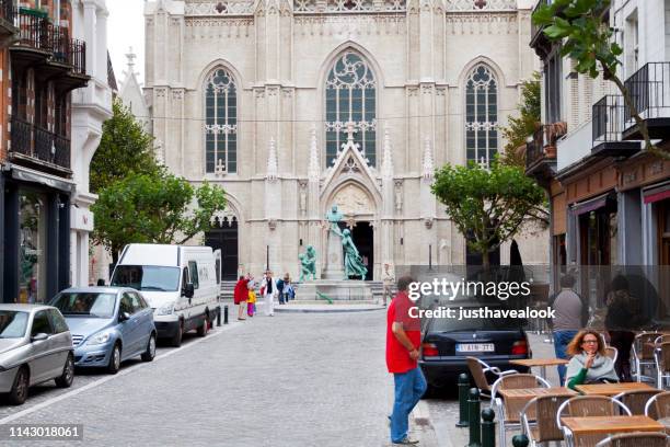street and church saint boniface in brussels - adult man brussels stock pictures, royalty-free photos & images