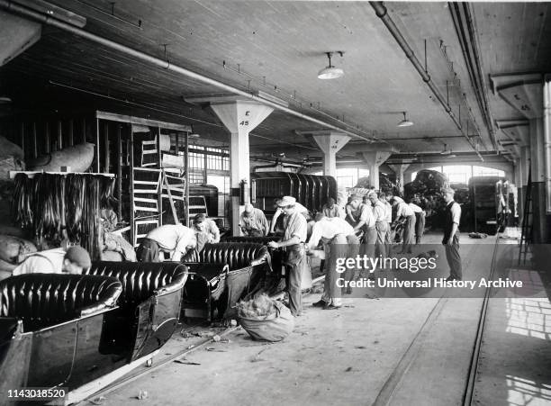 Photograph of the Ford Motor company production line. Detroit. Usa 1910.