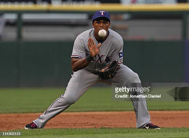 Adrian Beltre of the Texas Rangers fields the ball at 3rd base against the Chicago White Sox at U.S. Cellular Field on May 17, 2011 in Chicago,...