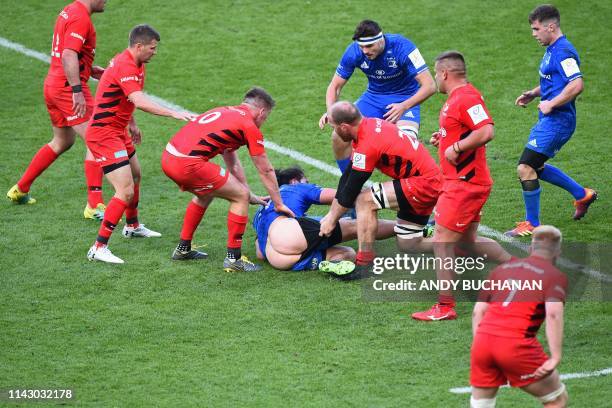 Leinster's New Zealand wing James Lowe loses his shorts in the tackle during the European Rugby Champions Cup final match between Leinster and...