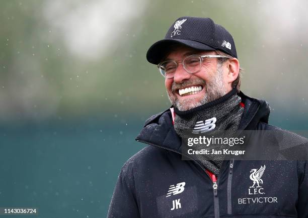 Jurgen Klopp, Manager of Liverpool reacts as he watches his team train during the Liverpool training session on the eve of the UEFA Champions League...