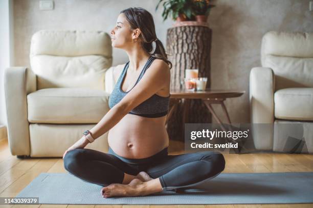 pregnant woman exercise yoga - pilates stock pictures, royalty-free photos & images