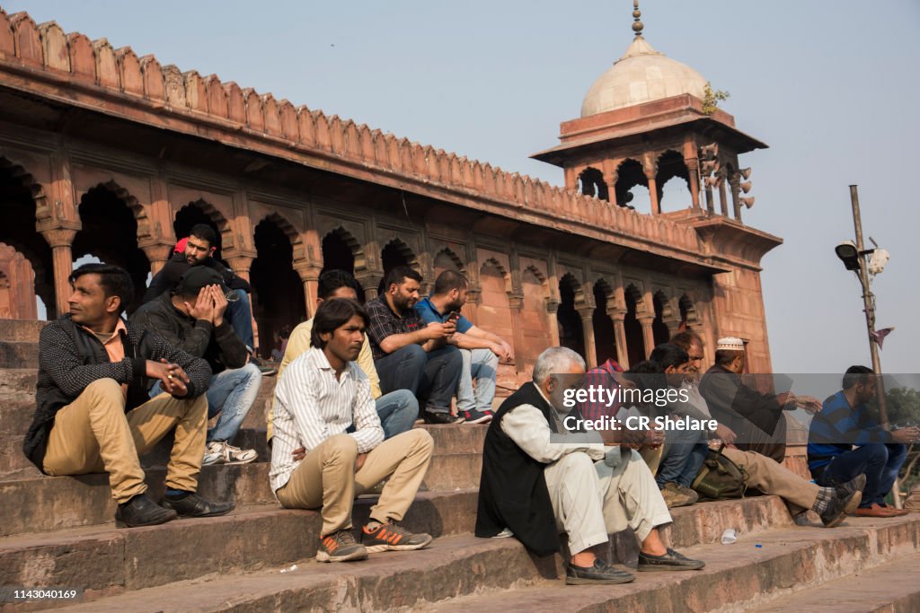 Tourist and local people visiting Jama Masjid mosque, Old Delhi, India.