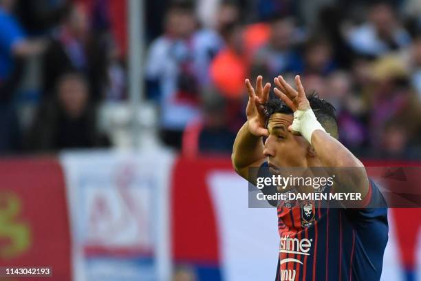 Caen's Moroccan midfielder Faycal Fajr celebrates after scoring a goal during the French L1 football match between Caen and Reims at the Michel...