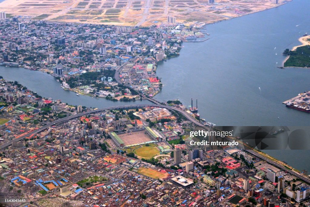 Lagos from the air - Lagos island and Victoria Island - central business district - Lagos Lagoon and Five Cowrie Creek, Nigeria