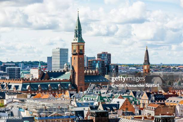 copenhagen skyline with town hall clock tower, denmark - kopenhagen stock-fotos und bilder