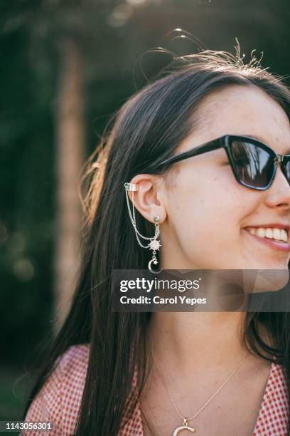 close up young with sunglasses and ear ring - earring stud stock pictures, royalty-free photos & images