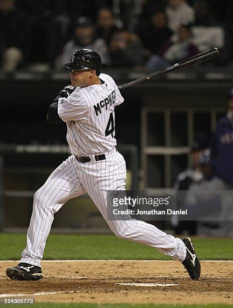 Dallas McPherson of the Chicago White Sox hits a pich-hit single in the 8th inning against the Texas Rangers at U.S. Cellular Field on May 17, 2011...