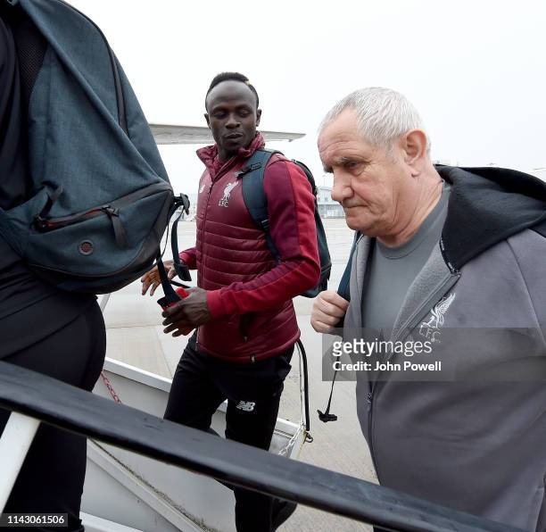 Sadio Mane of Liverpool boarding the plane at John Lennon Airport on April 16, 2019 in Liverpool, England.