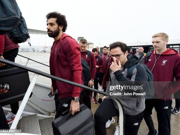 Mohamed Salah of Liverpool boarding the plane at John Lennon Airport on April 16, 2019 in Liverpool, England.