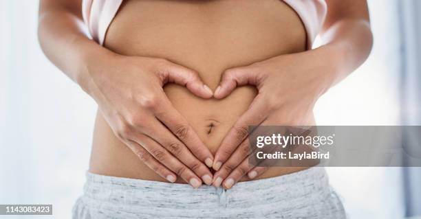 i love every detail of my body - flat stomach stock pictures, royalty-free photos & images