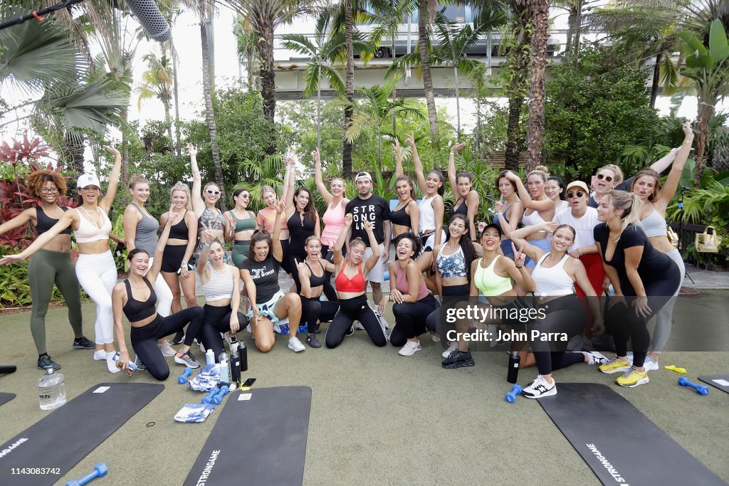 Kate Upton and Ben Bruno pose with Sports Illustrated Swimsuit models