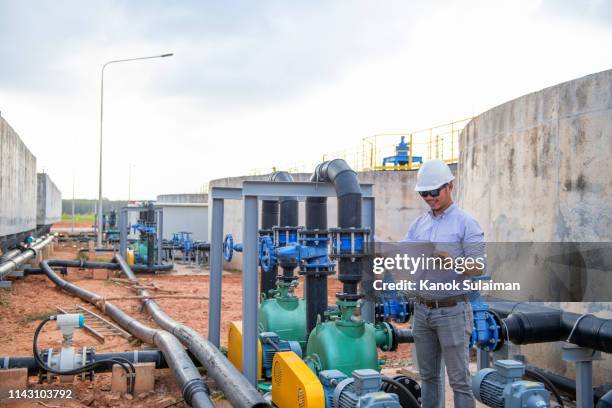 engineer in mechanical factory - sewage services stock pictures, royalty-free photos & images