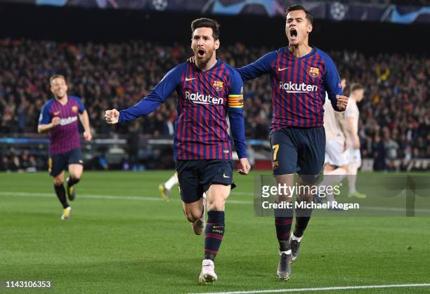 Lionel Messi of Barcelona celebrates after scoring his team's first goal with Philippe Coutinho of Barcelona during the UEFA Champions League Quarter...