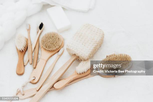 spa wooden brushes various exfoliating elements - hair brush stock pictures, royalty-free photos & images