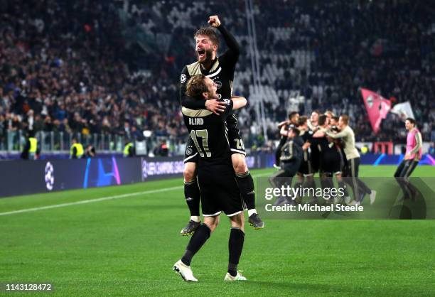 Lasse Schone of Ajax celebrates victory with Daley Blind of Ajax during the UEFA Champions League Quarter Final second leg match between Juventus and...