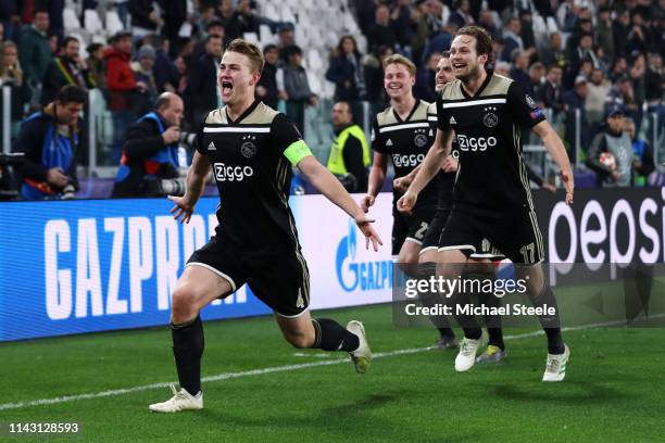 Matthijs de Ligt of Ajax celebrates victory with his team mates after the UEFA Champions League Quarter Final second leg match between Juventus and...