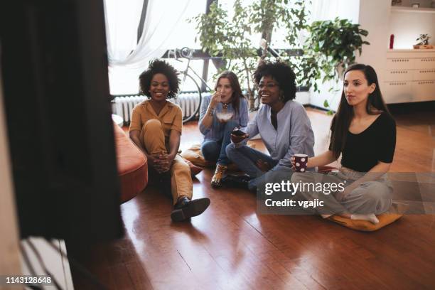 roommates - shared living - sitting on ground stock pictures, royalty-free photos & images