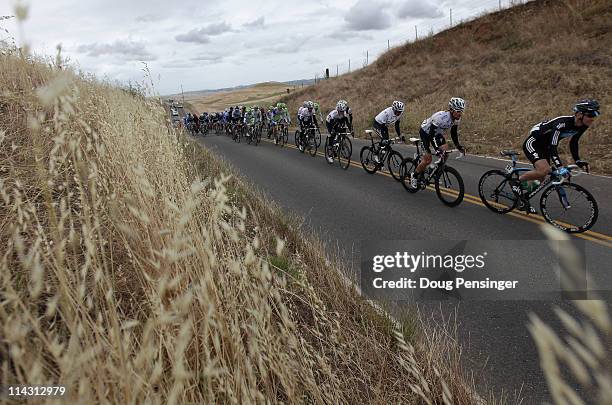 Kurt-Asle Arvesen of Norway riding for Sky Procycling leads the peloton as they roll through the countryside during stage three of the 2011 AMGEN...