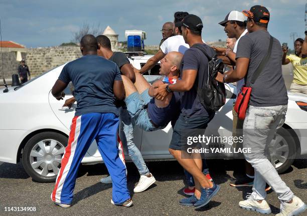 Cuban police arrest demonstrators taking part in the LGTBI march in Havana, on May 11, 2019. More than a hundred people participate in a...