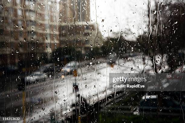 rainy day apartments - smart cities stockfoto's en -beelden