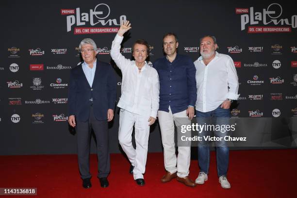 President of EGEDA, Enrique Cerezo, spanish singer and actor Raphael, Miguel Angel Benzal and Adrian Solar attend a ceremony to present the winner of...