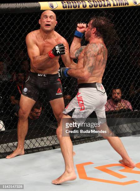 Clay Guida punches BJ Penn in their lightweight bout during the UFC 237 event at Jeunesse Arena on May 11, 2019 in Rio De Janeiro, Brazil.