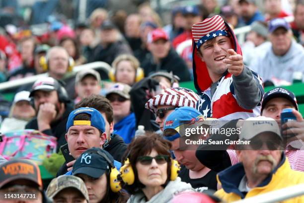 Race fan cheers during the Monster Energy NASCAR Cup Series Digital Ally 400 at Kansas Speedway on May 11, 2019 in Kansas City, Kansas.