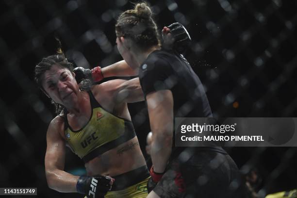Mexican fighter Irene Aldana competes against Brazilian fighter Bethe Correia during their women's bantamweight bout at the Ultimate Fighting...