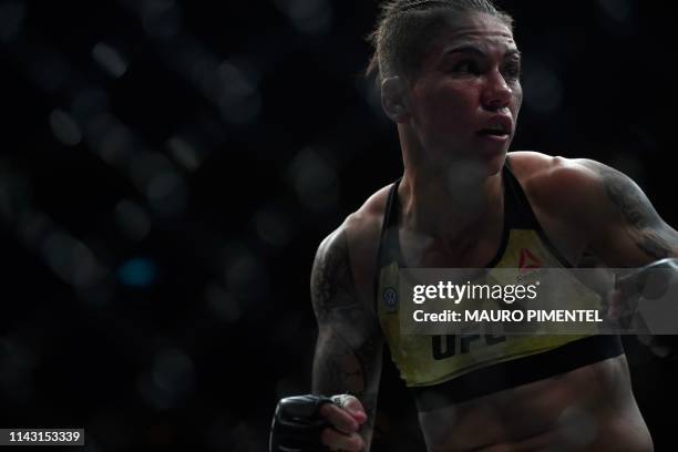 Brazilian fighter Jessica Andrade is seen competing against US fighter Rose Namajunas during their women's strawweight title bout at the Ultimate...