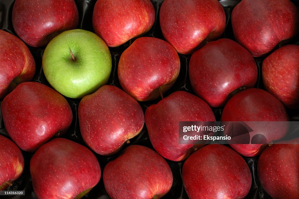 One Green Apple among the Reds