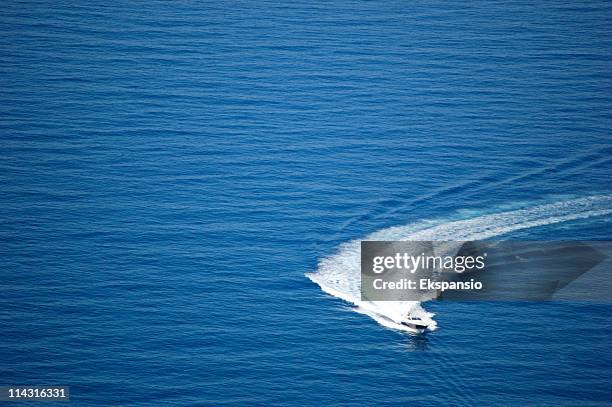 speeding round the mediterranean - motor boats stock pictures, royalty-free photos & images