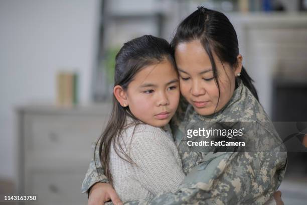 saying goodbye - filipino family reunion stock pictures, royalty-free photos & images