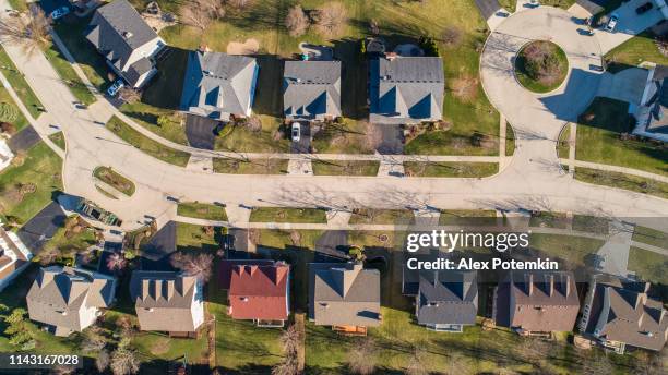 top view directly above drone aerial view of the street in the residential neighborhood libertyville, vernon hills, chicago, illinois. - aerial barn stock pictures, royalty-free photos & images