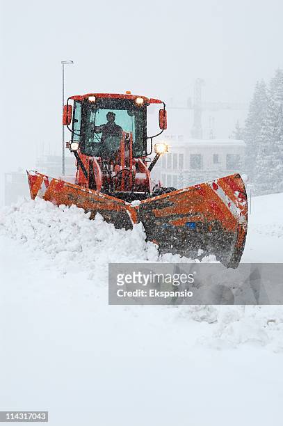 snowplowing in blizzard - snow plow stock pictures, royalty-free photos & images