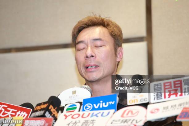 Singer Andy Hui Chi-on attends a press conference as he admits to having an extramarital affair on April 16, 2019 in Hong Kong, China.