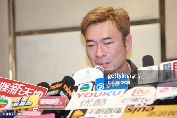 Singer Andy Hui Chi-on attends a press conference as he admits to having an extramarital affair on April 16, 2019 in Hong Kong, China.