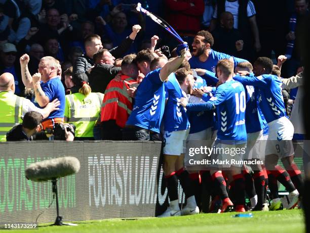 Rangers players celebrate their second goal with the crowd during the Ladbrokes Scottish Premiership match between Rangers and Celtic at Ibrox...