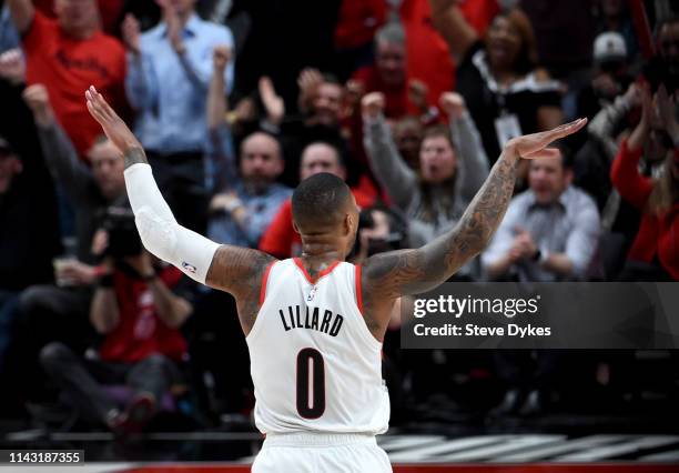 Damian Lillard of the Portland Trail Blazers reacts after hitting a shot during the second half of Game Two of the Western Conference quarterfinals...