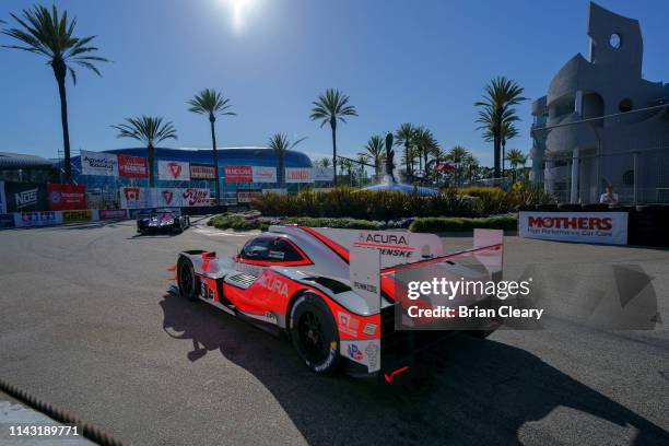 The Acura DPi of Juan Pablo Montoya, of Colombia and Dane Cameron races on the track during practice for the IMSA WeatherTech Series race at the...