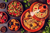Traditional moroccan tajine of chicken with dried fruits and spices
