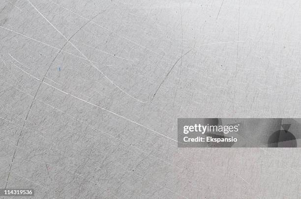 scratched gray metal background - rvs stockfoto's en -beelden