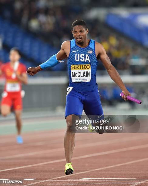 Remontay McClain of the US crosses the finish line during the men's 4x200 metres relay final at the IAAF World Relays athletics event at Nissan...