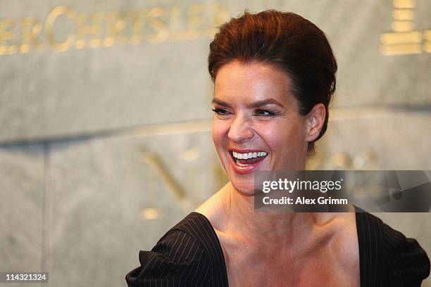 Katarina Witt, Chair of Munich 2018, laughs during the briefing for IOC members at the Olympic Museum on May 18, 2011 in Lausanne, Switzerland. The...