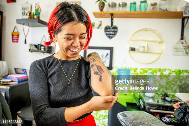 Stong Independent Artistic Business Women Who Design And Create Tattoos  From Their Bright And Unique Shop High-Res Stock Photo - Getty Images