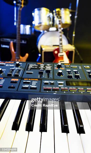 synthesizer, guitar and drums - red electric guitar stock pictures, royalty-free photos & images