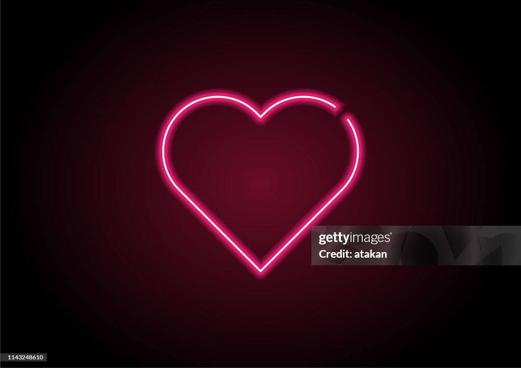 Herzform-rotes Neonlicht auf schwarzer Wand