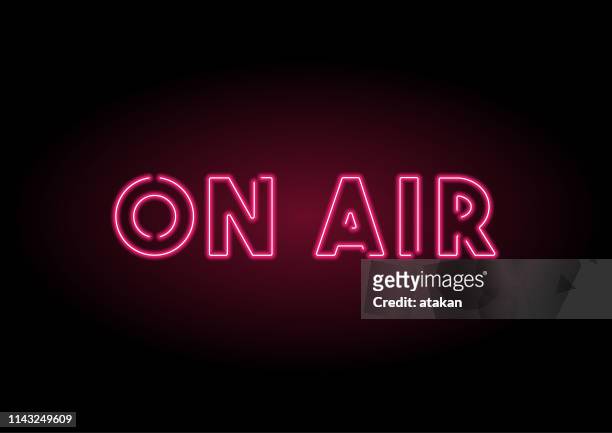 on air red neon light on black wall - abc broadcasting company stock illustrations