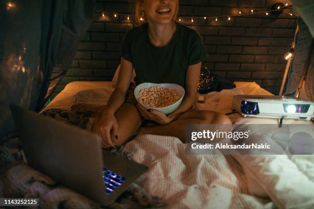 movie night - player video stock pictures, royalty-free photos & images